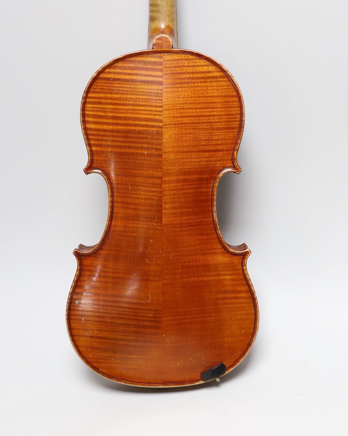 A cased 19th century French violin, back 34cm